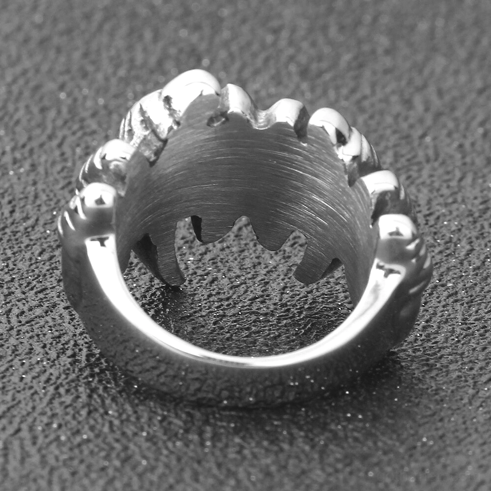 Inner top view of stainless steel wolf claw ring showing serrated edge and interior craftsmanship