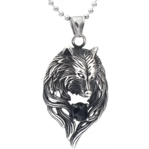 Predatory wolf head pendant necklace front view with black crystal inlay on white background, stainless steel gothic jewelry