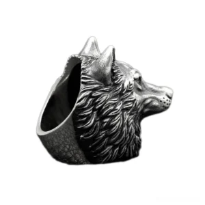 Vintage wolf ring side profile displaying intricate mane carving and inner band details