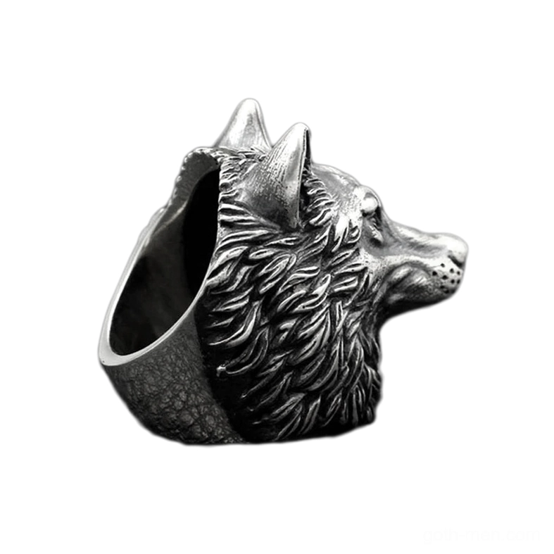 Vintage wolf ring side profile displaying intricate mane carving and inner band details