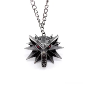 Wolf head pendant with red glowing eyes and heavy link metal chain, front view showcasing gothic aesthetic and mystical design