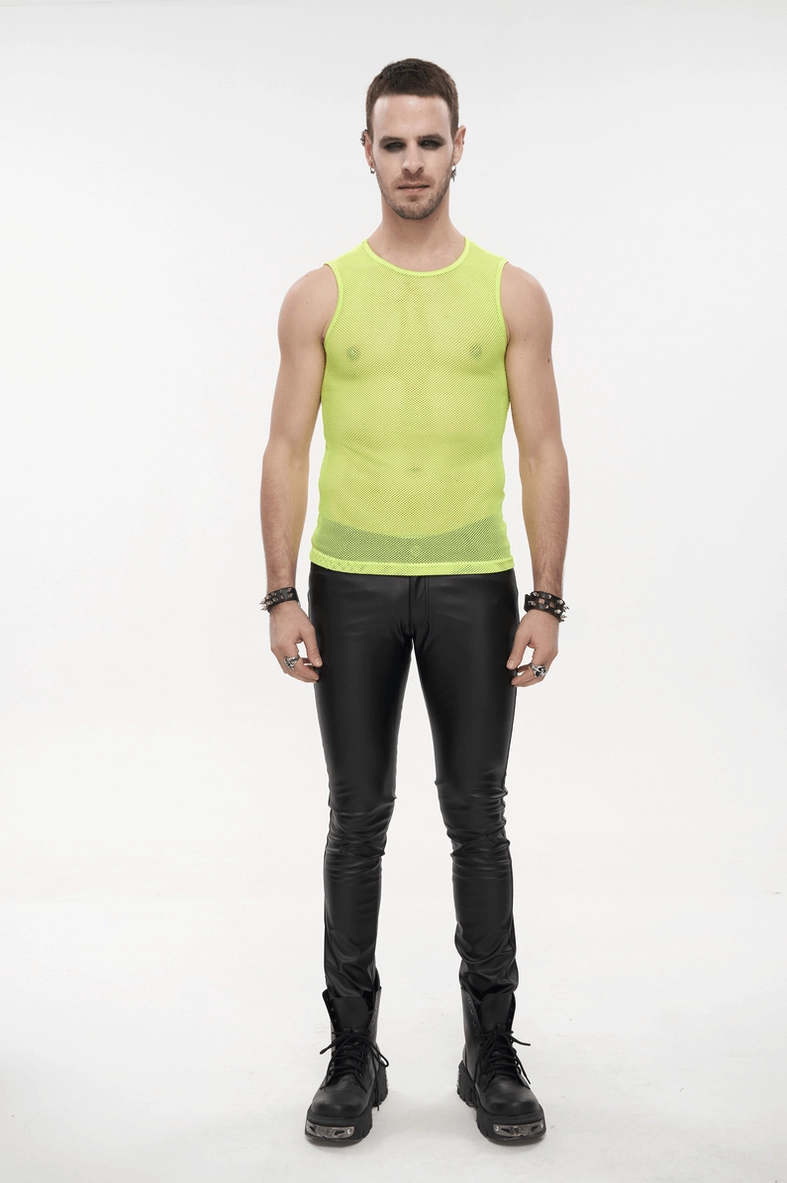 Neon yellow mesh tank top worn with black leather pants and punk accessories