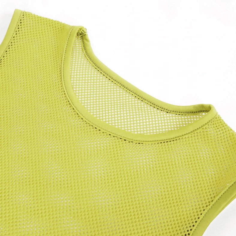 Yellow see-through mesh tank top side profile view on model